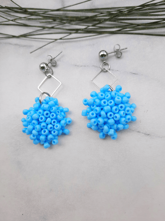 Blue silver ball earrings